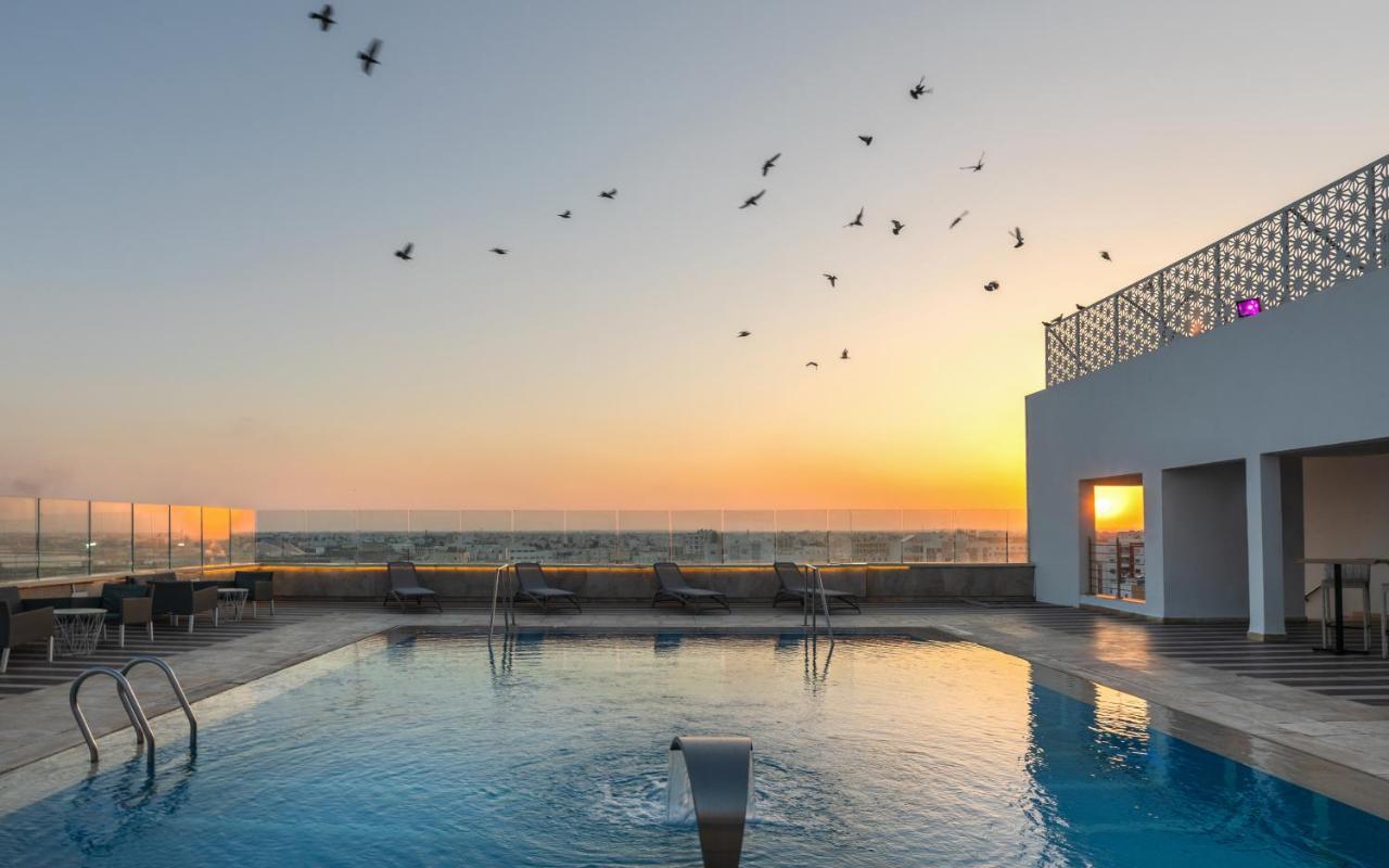 Radisson Hotel Sfax Exterior photo Rooftop pool at the hotel