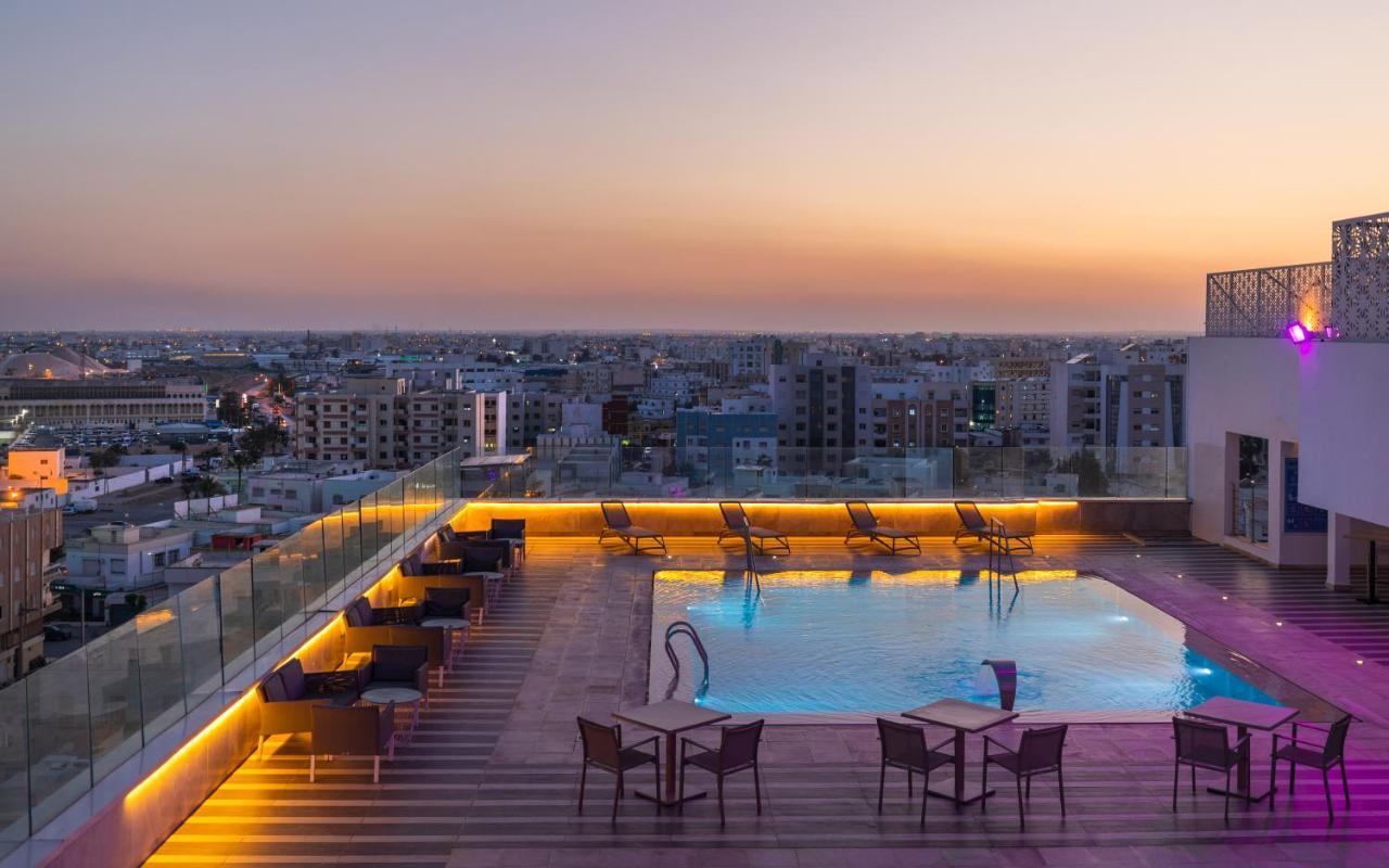Radisson Hotel Sfax Exterior photo Rooftop pool at the hotel