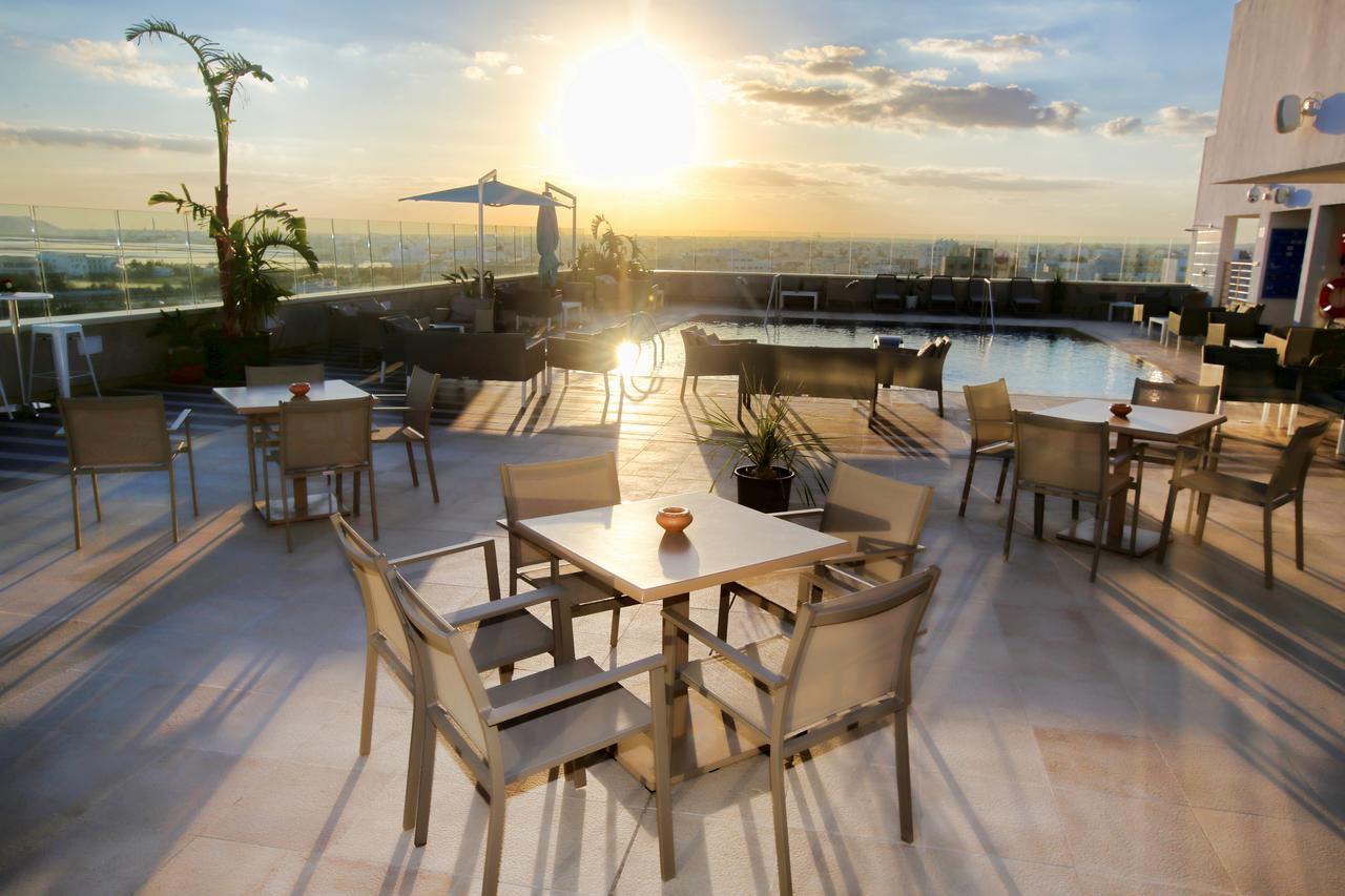 Radisson Hotel Sfax Exterior photo Rooftop pool at the hotel